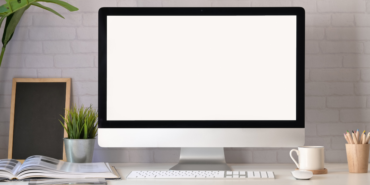Mockup modern blank screen desktop computer on stylish workspace