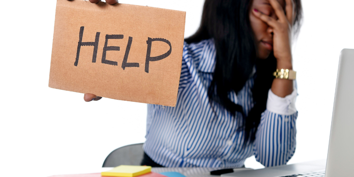 African American ethnicity woman tired and frustrated working in stress in office